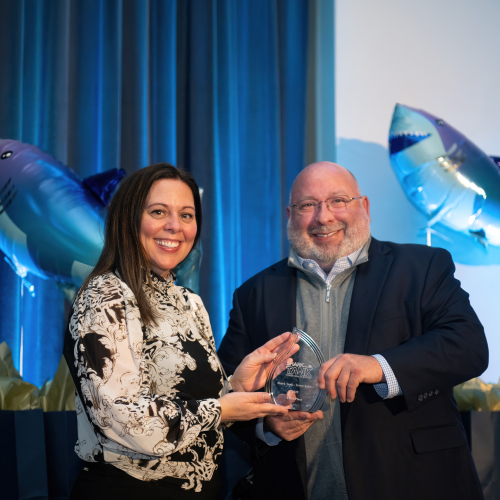 Third place winner Tania Nguyen, EPIC Credential Trainer, in Tower Health’s IT Department, and Michael Stern, Tower Health president and COO at Shark Tank: Tower Health Edition 2025