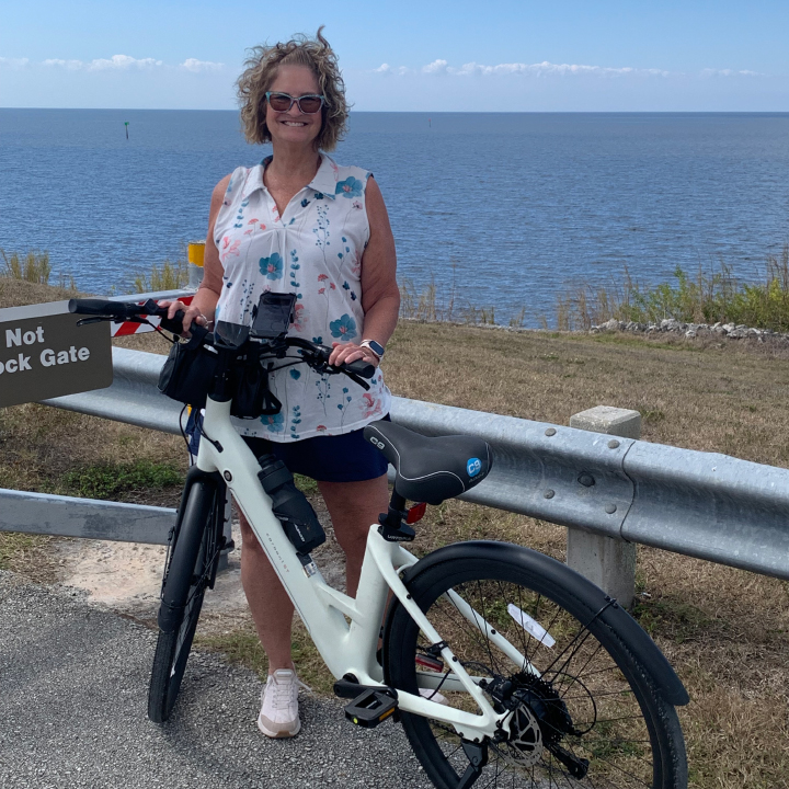 A same-day knee replacement patient is shown alongside her bike