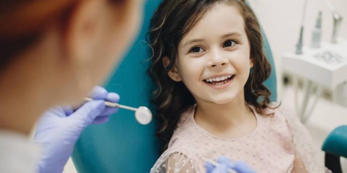 Girl in dentist's chair