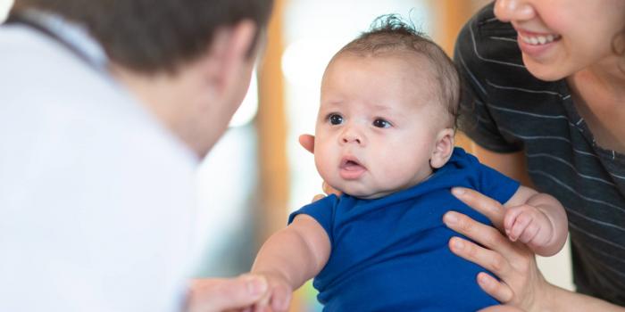 Mom and doctor with baby