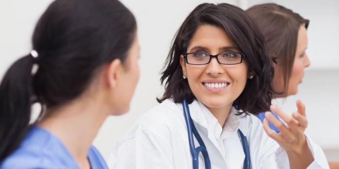 Cancer Care group of doctors and patient at Tower Health