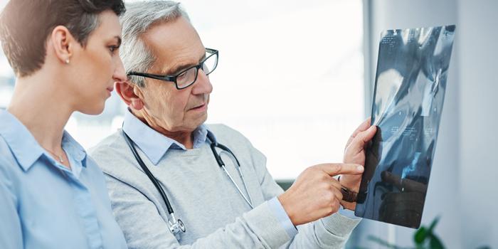 physicians looking at x-ray