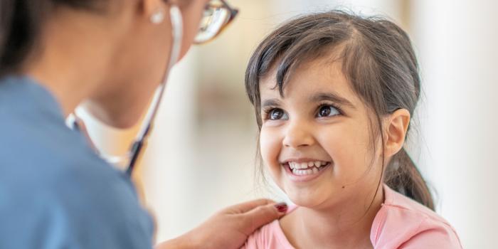 little girl having her heart checked