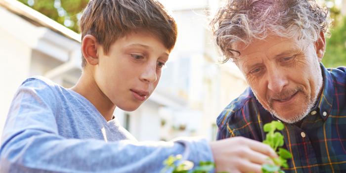 boy and man with plant