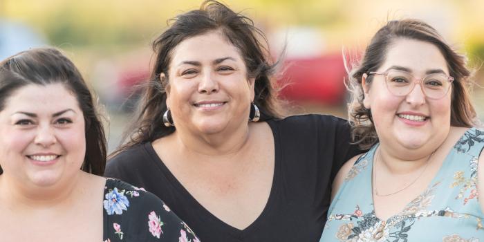 Three woman smiling outside for Tower Health Weight Management